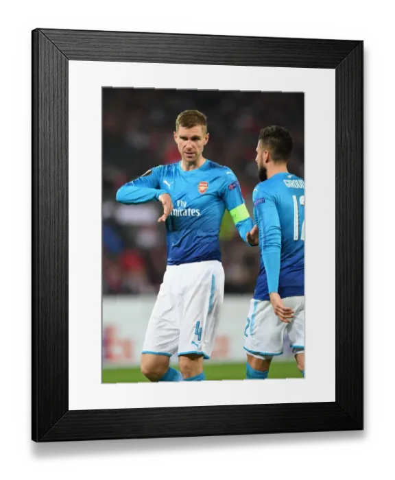 Framed Print : Per Mertesacker in Action: Arsenal vs. 1. FC Koln, UEFA Europa League (2017) Framed Print : Per Mertesacker in Action: Arsenal vs. 1. FC Koln, UEFA Europa League (2017)