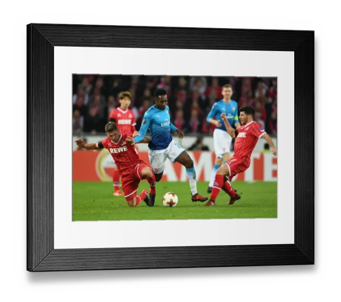 Framed Print : Danny Welbeck vs. Milos Mere: Clash in the UEFA Europa League between Arsenal and 1. FC Koln Framed Print : Danny Welbeck vs. Milos Mere: Clash in the UEFA Europa League between Arsenal and 1. FC Koln