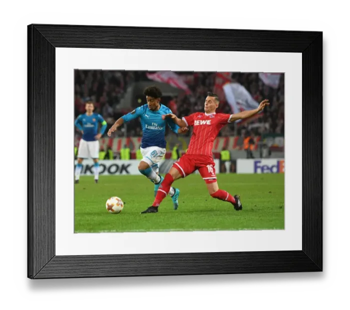 Framed Print : Reiss Nelson Outmaneuvers Pawel Olkowski: Arsenal's Europa League Clash vs. 1. FC Koln Framed Print : Reiss Nelson Outmaneuvers Pawel Olkowski: Arsenal's Europa League Clash vs. 1. FC Koln