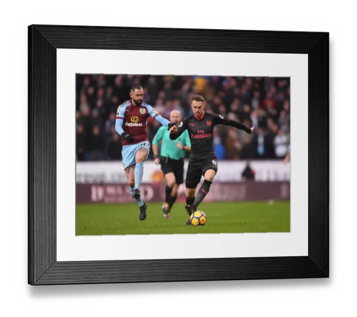 Framed Print : Clash of Midfielders: Ramsey vs. Defour - Burnley vs. Arsenal, Premier League 2017-18 Framed Print : Clash of Midfielders: Ramsey vs. Defour - Burnley vs. Arsenal, Premier League 2017-18
