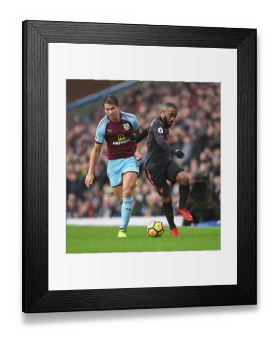 Framed Print : Clash of Titans: Lacazette vs. Tarkowski in Burnley vs. Arsenal Premier League Showdown Framed Print : Clash of Titans: Lacazette vs. Tarkowski in Burnley vs. Arsenal Premier League Showdown
