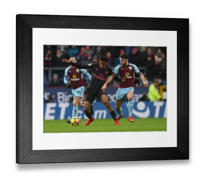 Framed Print : Clash at Turf Moor: Iwobi vs Brady in Burnley vs Arsenal Premier League Showdown Framed Print : Clash at Turf Moor: Iwobi vs Brady in Burnley vs Arsenal Premier League Showdown