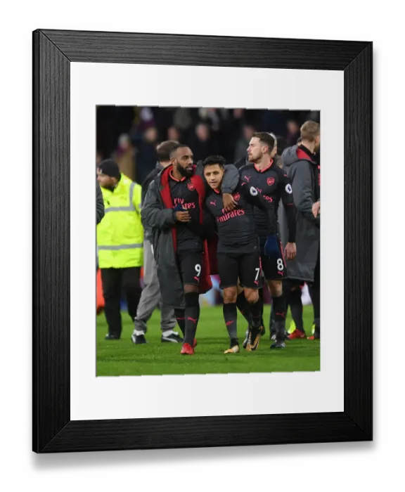 Framed Print : Arsenal's Unstoppable Strikers: Lacazette and Sanchez Celebrate Victory over Burnley