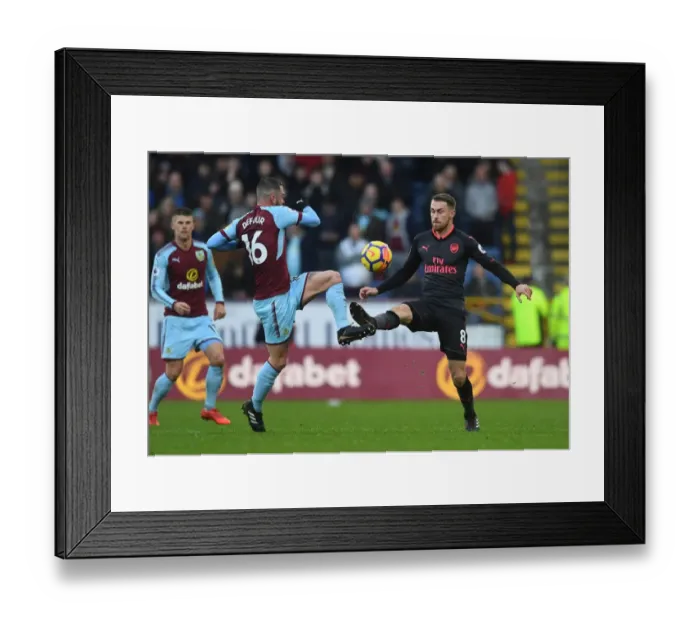 Framed Print : Clash of Midfielders: Ramsey vs Defour - Burnley vs Arsenal, Premier League 2017-18