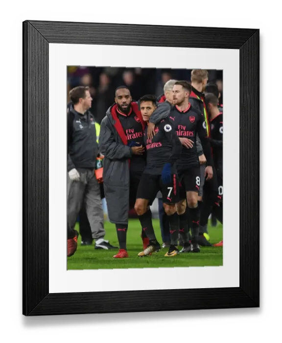 Framed Print : Celebrating Victory: Lacazette and Sanchez's Jubilant Moment after Arsenal's Win against Burnley Framed Print : Celebrating Victory: Lacazette and Sanchez's Jubilant Moment after Arsenal's Win against Burnley