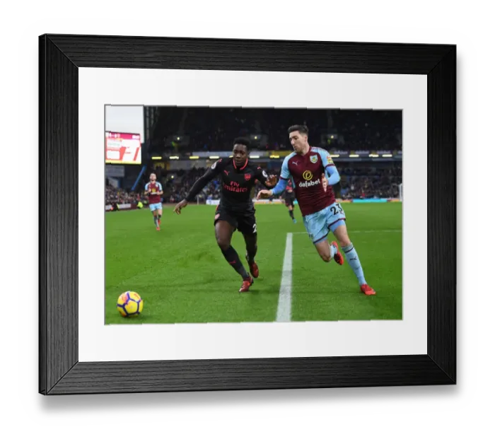Framed Print : Danny Welbeck vs. Stephen Ward: Clash at Turf Moor - Burnley vs. Arsenal, Premier League 2017-18 Framed Print : Danny Welbeck vs. Stephen Ward: Clash at Turf Moor - Burnley vs. Arsenal, Premier League 2017-18