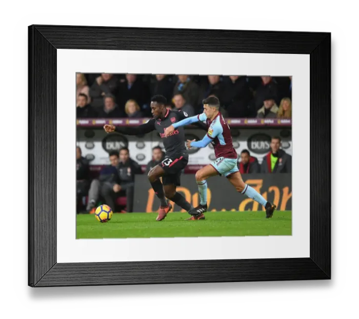 Framed Print : Danny Welbeck vs. Matthew Lowton: A Battle in the Premier League Clash Between Burnley and Arsenal