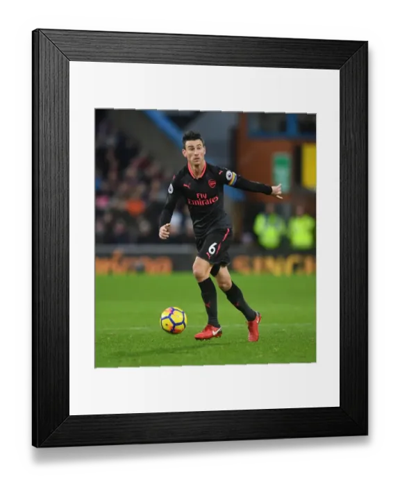 Framed Print : Laurent Koscielny Focuses in Burnley's Turf: Arsenal vs Burnley, Premier League 2017-18