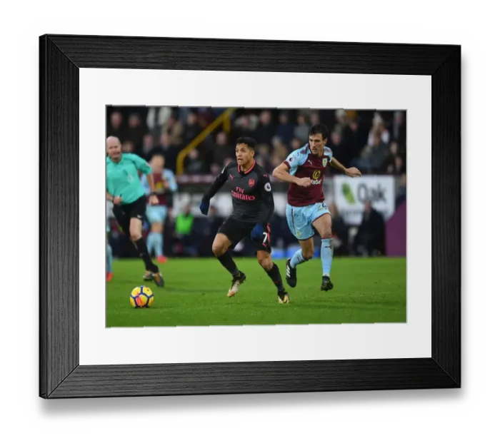 Framed Print : Clash of Midfielders: Sanchez vs. Cork in Burnley v Arsenal, Premier League 2017-18 Framed Print : Clash of Midfielders: Sanchez vs. Cork in Burnley v Arsenal, Premier League 2017-18