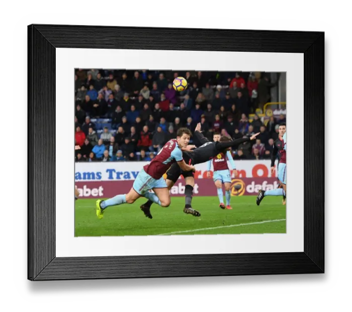 Framed Print : Ramsey vs Tarkowski: Intense Clash in Burnley v Arsenal Premier League Encounter