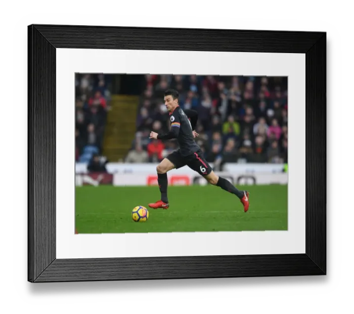 Framed Print : Arsenal's Koscielny Focuses Amid Burnley's Turf (2017-18) Framed Print : Arsenal's Koscielny Focuses Amid Burnley's Turf (2017-18)