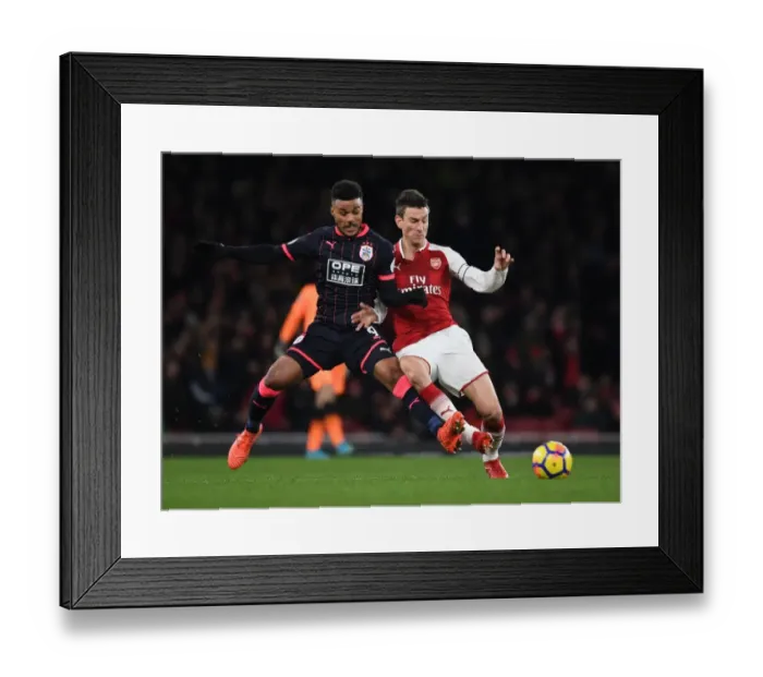Framed Print : Clash of Titans: Koscielny vs. Kachunga - Arsenal's Premier League Showdown