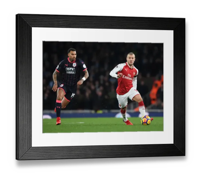 Framed Print : Jack Wilshere Outsmarts Danny Williams: Arsenal's Midfield Maestro Dazzles Huddersfield Town, Premier League 2017-18 Framed Print : Jack Wilshere Outsmarts Danny Williams: Arsenal's Midfield Maestro Dazzles Huddersfield Town, Premier League 2017-18