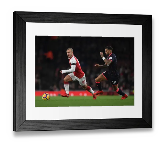 Framed Print : Intense Face-Off: Wilshere vs. Kachunga in Arsenal's Premier League Battle Framed Print : Intense Face-Off: Wilshere vs. Kachunga in Arsenal's Premier League Battle