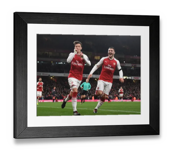 Framed Print : Arsenal's Ozil and Kolasinac: Unstoppable Duo Celebrates Fourth Goal vs. Huddersfield Town (2017-18)