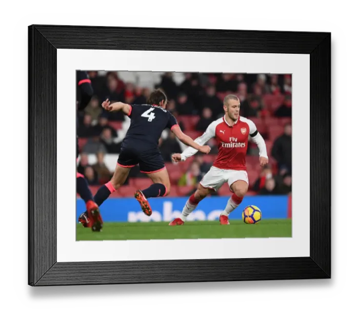 Framed Print : Intense Rivalry: Wilshere vs. Whitehead Clash in Arsenal vs. Huddersfield Football Match