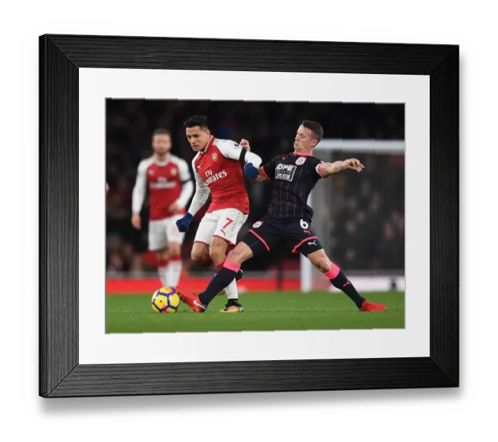 Framed Print : Clash at Emirates: Sanchez vs. Hogg in Arsenal's Battle Against Huddersfield Framed Print : Clash at Emirates: Sanchez vs. Hogg in Arsenal's Battle Against Huddersfield
