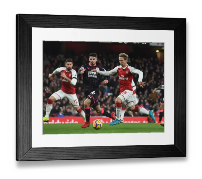 Framed Print : Monreal vs. Schindler: Battle at the Emirates - Arsenal vs. Huddersfield Town, Premier League 2017-18
