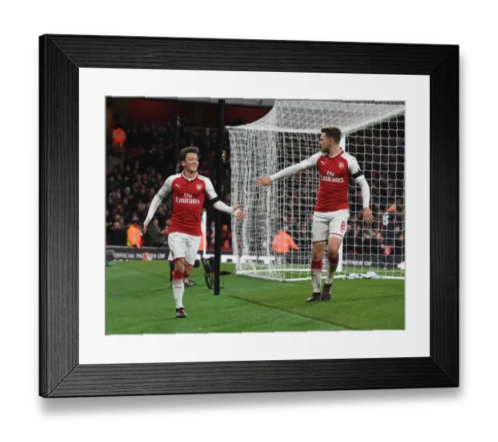 Framed Print : Arsenal's Ozil and Ramsey Celebrate Third Goal vs. Huddersfield Town, 2017-18 Season Framed Print : Arsenal's Ozil and Ramsey Celebrate Third Goal vs. Huddersfield Town, 2017-18 Season