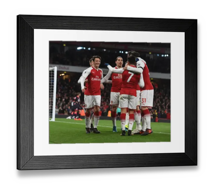 Framed Print : Arsenal Triumph: Ozil, Sanchez, Bellerin Celebrate Goals Against Huddersfield Town Framed Print : Arsenal Triumph: Ozil, Sanchez, Bellerin Celebrate Goals Against Huddersfield Town