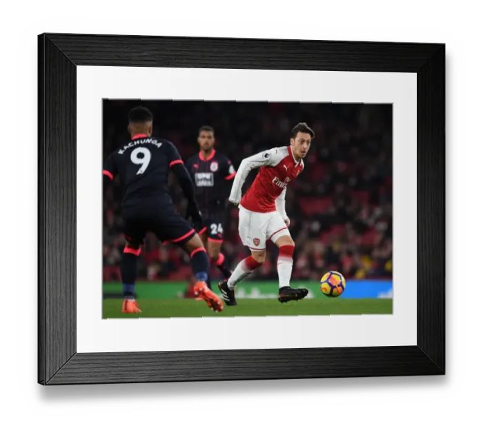 Framed Print : Mesut Ozil vs Elias Kachunga: Battle at the Emirates - Arsenal v Huddersfield Town, Premier League 2017-18 Framed Print : Mesut Ozil vs Elias Kachunga: Battle at the Emirates - Arsenal v Huddersfield Town, Premier League 2017-18