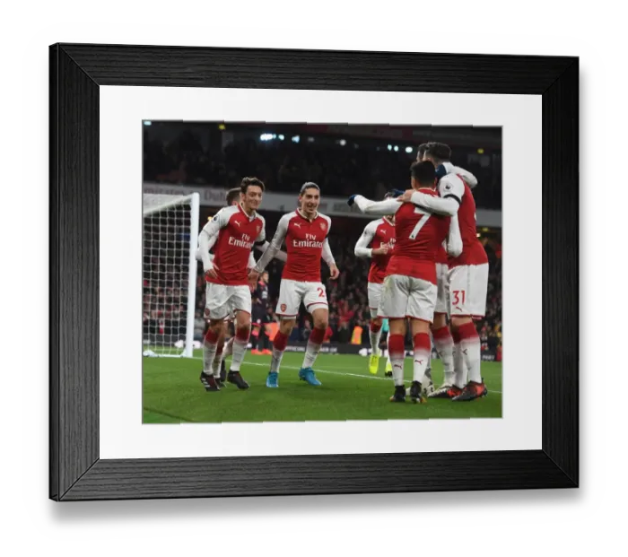 Framed Print : Arsenal's Triumph: Ozil, Sanchez, Bellerin in Glory - Celebrating a Memorable Win over Huddersfield Town Framed Print : Arsenal's Triumph: Ozil, Sanchez, Bellerin in Glory - Celebrating a Memorable Win over Huddersfield Town