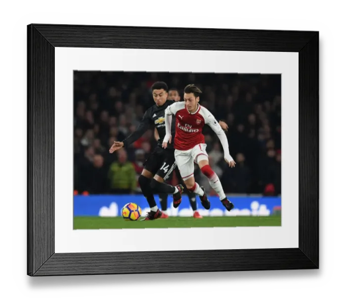 Framed Print : Mesut Ozil vs Jesse Lingard: Battle at the Emirates - Arsenal vs Manchester United, Premier League 2017-18 Framed Print : Mesut Ozil vs Jesse Lingard: Battle at the Emirates - Arsenal vs Manchester United, Premier League 2017-18