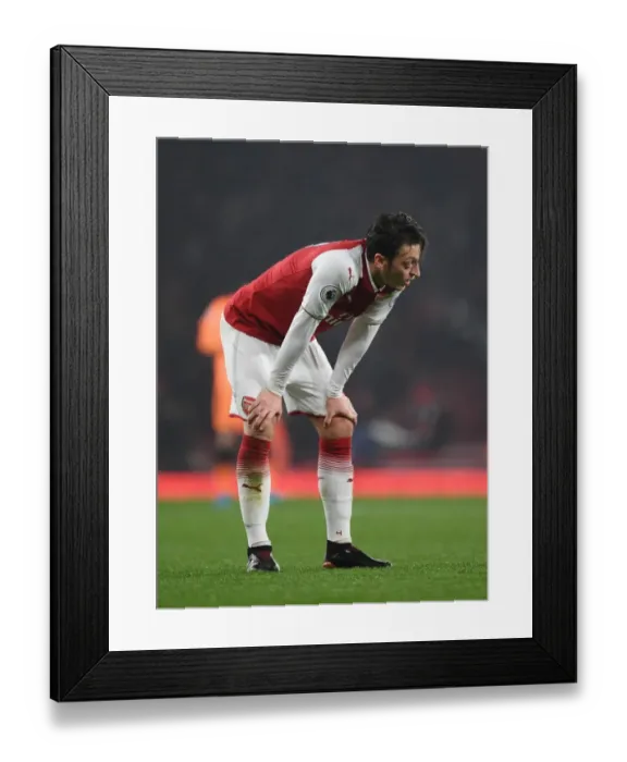 Framed Print : Mesut Ozil: Dejected After Arsenal's Loss to Manchester United (2017-18) Framed Print : Mesut Ozil: Dejected After Arsenal's Loss to Manchester United (2017-18)