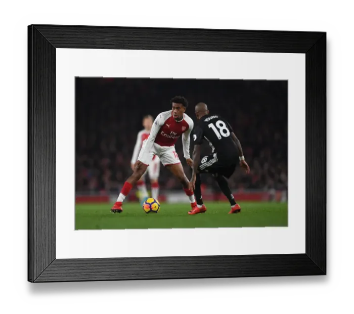 Framed Print : Clash of Wings: Iwobi vs. Young - Arsenal vs. Manchester United, Premier League 2017-18