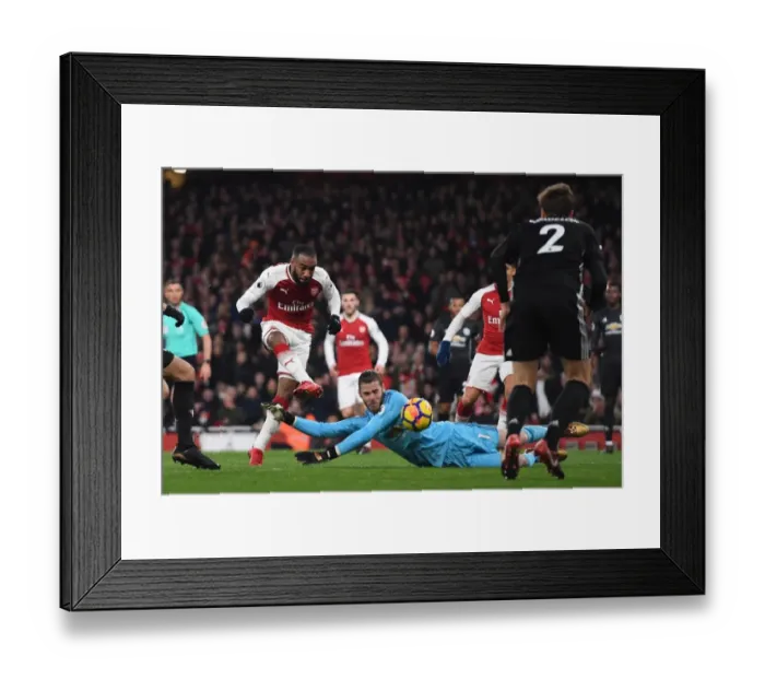 Framed Print : Lacazette vs. De Gea: Premier League Showdown at Emirates Stadium