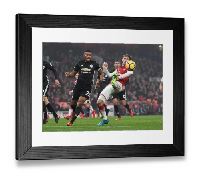 Framed Print : Monreal vs Valencia: Intense Battle at Emirates Stadium - Arsenal vs Manchester United, Premier League 2017-18 Framed Print : Monreal vs Valencia: Intense Battle at Emirates Stadium - Arsenal vs Manchester United, Premier League 2017-18
