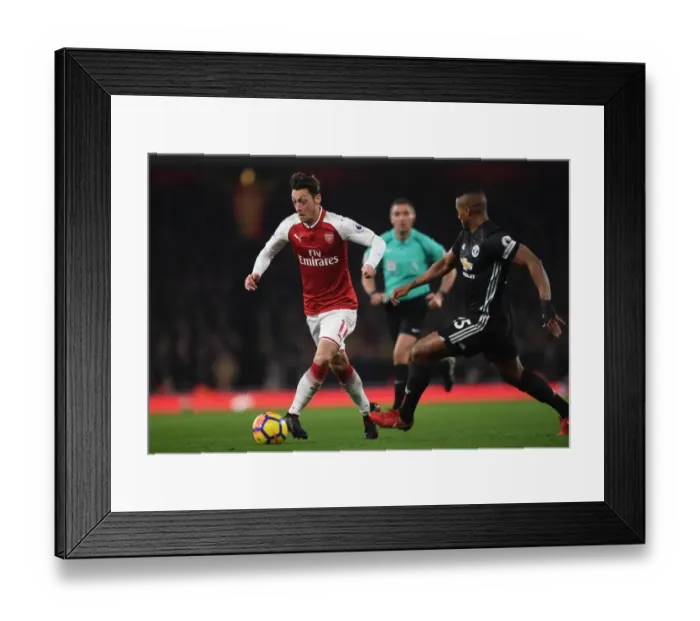 Framed Print : Mesut Ozil vs. Antonio Valencia: Battle at the Emirates - Arsenal vs. Manchester United (2017-18)