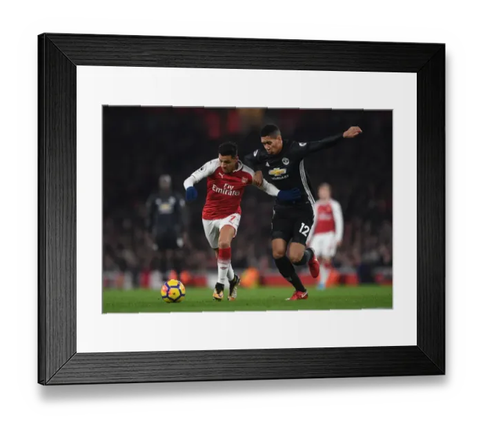 Framed Print : Clash of Titans: Sanchez vs Smalling - Arsenal vs Manchester United, Premier League 2017-18 Framed Print : Clash of Titans: Sanchez vs Smalling - Arsenal vs Manchester United, Premier League 2017-18