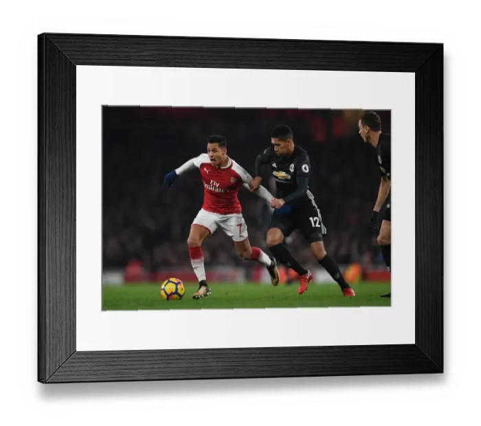 Framed Print : Clash of Titans: Sanchez vs Smalling - A Wit and Skill Battle: Arsenal's Sanchez vs Manchester United's Smalling, Premier League 2017-18