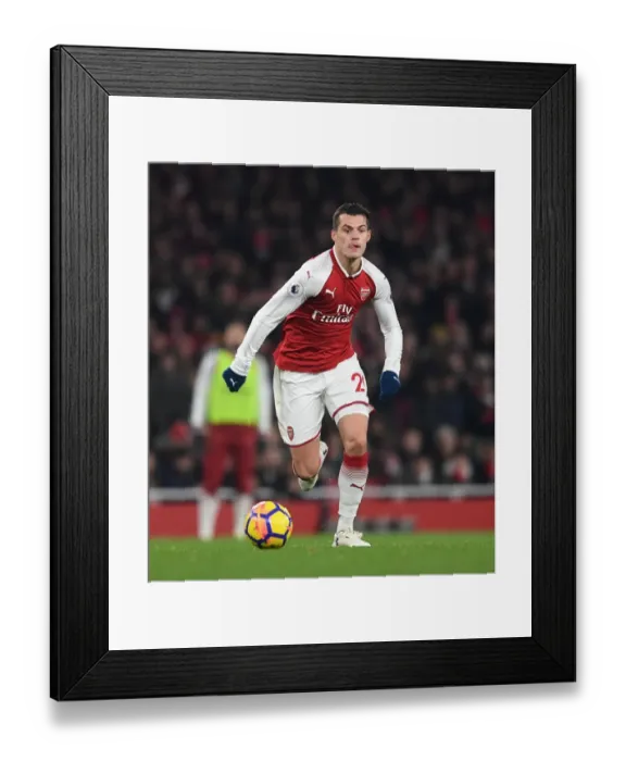 Framed Print : Granit Xhaka: Arsenal's Midfield Mastermind in Action vs. Manchester United, Premier League 2017-18