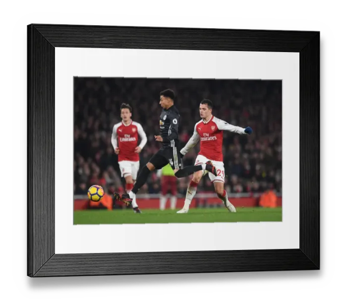 Framed Print : Xhaka vs Lingard: Intense Battle in Arsenal v Manchester United Premier League Clash Framed Print : Xhaka vs Lingard: Intense Battle in Arsenal v Manchester United Premier League Clash
