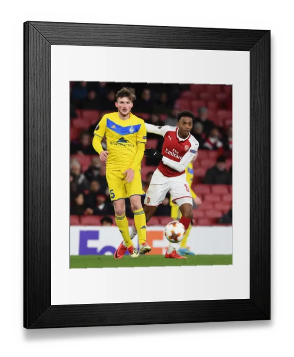 Framed Print : Arsenal's Joe Willock Clashes with BATE's Dmitri Baga in Europa League Showdown Framed Print : Arsenal's Joe Willock Clashes with BATE's Dmitri Baga in Europa League Showdown