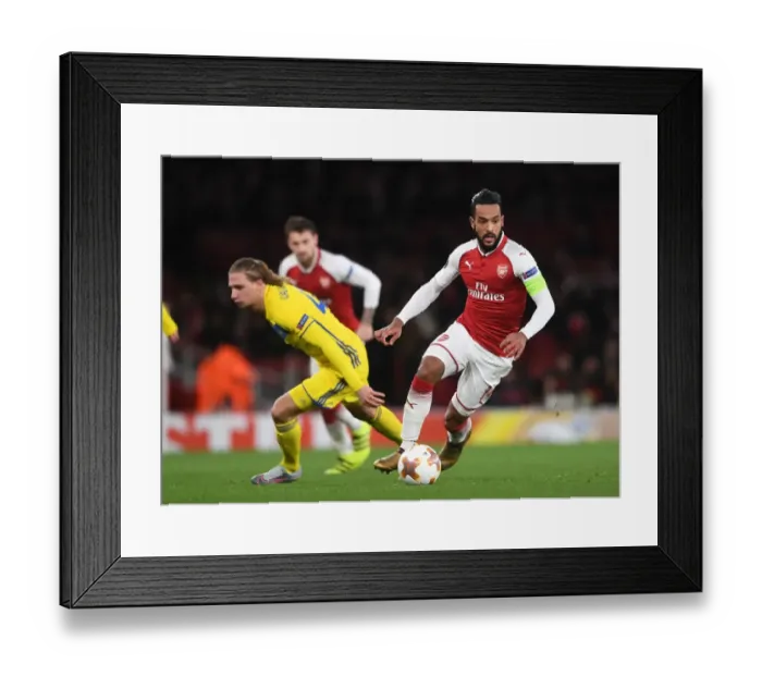 Framed Print : Theo Walcott vs. Maksim Volodko: A Football Battle in the Arsenal FC vs. BATE Borisov UEFA Europa League Match Framed Print : Theo Walcott vs. Maksim Volodko: A Football Battle in the Arsenal FC vs. BATE Borisov UEFA Europa League Match