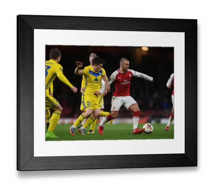 Framed Print : Jack Wilshere vs. Stanislav Dragun: A Europa League Showdown
