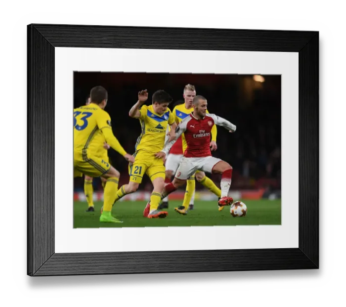 Framed Print : Jack Wilshere vs. Stanislav Dragun: Arsenal FC vs. BATE Borisov, UEFA Europa League Showdown