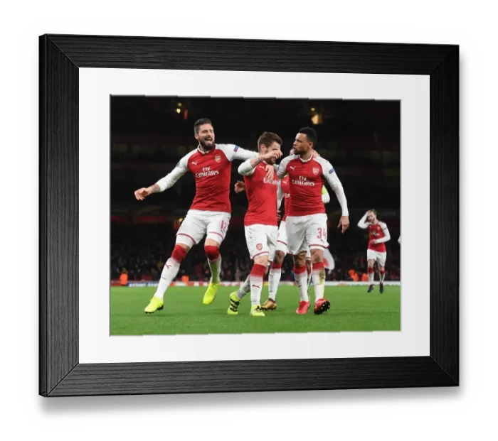 Framed Print : Arsenal Celebrate Debuchy's Goal Against BATE Borisov in Europa League Framed Print : Arsenal Celebrate Debuchy's Goal Against BATE Borisov in Europa League