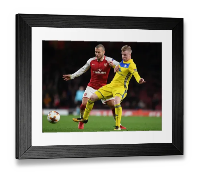 Framed Print : Arsenal's Jack Wilshere vs Evgeni Berezkin in Europa League Showdown Framed Print : Arsenal's Jack Wilshere vs Evgeni Berezkin in Europa League Showdown