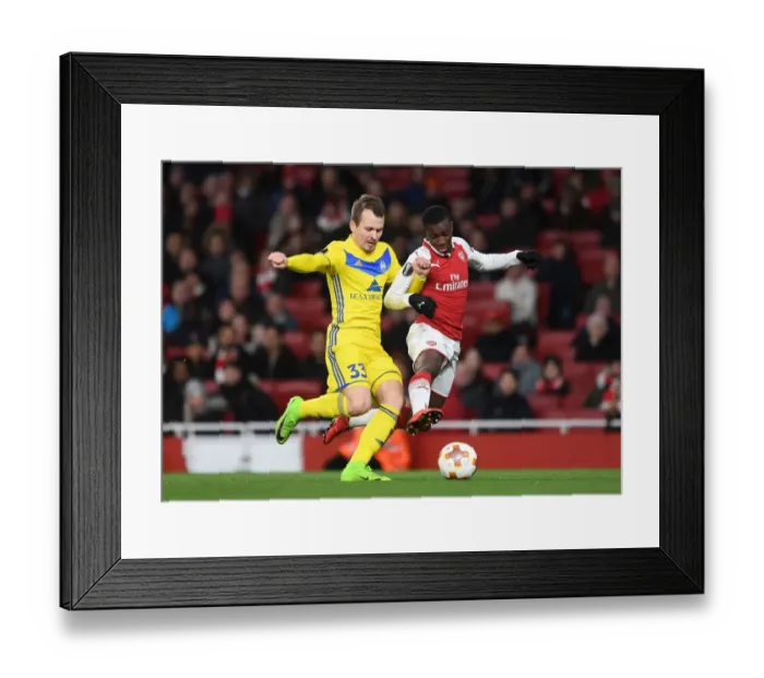 Framed Print : Arsenal's Eddie Nketiah Goes Head-to-Head with Denis Polyakov in Europa League Showdown Framed Print : Arsenal's Eddie Nketiah Goes Head-to-Head with Denis Polyakov in Europa League Showdown