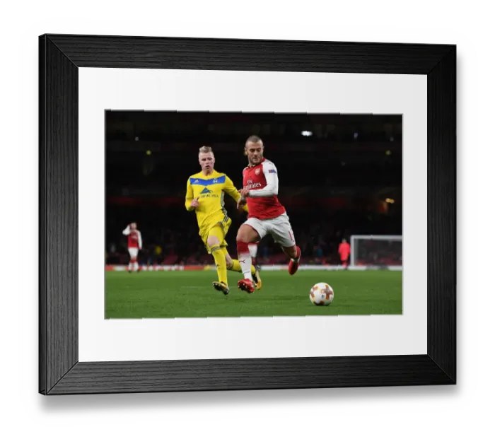 Framed Print : Arsenal's Jack Wilshere Clashes with BATE Borisov's Evgeni Berezkin in Europa League Showdown Framed Print : Arsenal's Jack Wilshere Clashes with BATE Borisov's Evgeni Berezkin in Europa League Showdown