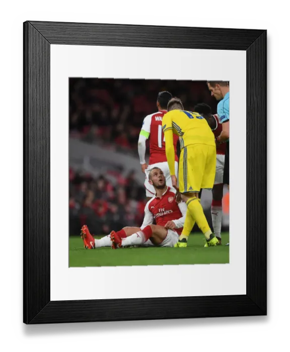 Framed Print : Arsenal's Jack Wilshere Confronts BATE Borisov's Nemanja Milunovic during Europa League Clash Framed Print : Arsenal's Jack Wilshere Confronts BATE Borisov's Nemanja Milunovic during Europa League Clash