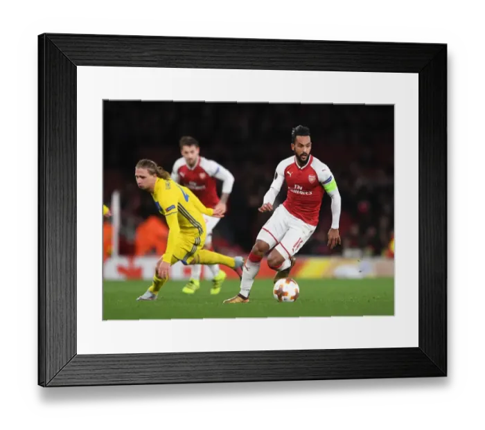 Framed Print : Theo Walcott vs Maksim Volodko: A Fierce Face-Off in Arsenal FC's UEFA Europa League Battle against BATE Borisov Framed Print : Theo Walcott vs Maksim Volodko: A Fierce Face-Off in Arsenal FC's UEFA Europa League Battle against BATE Borisov