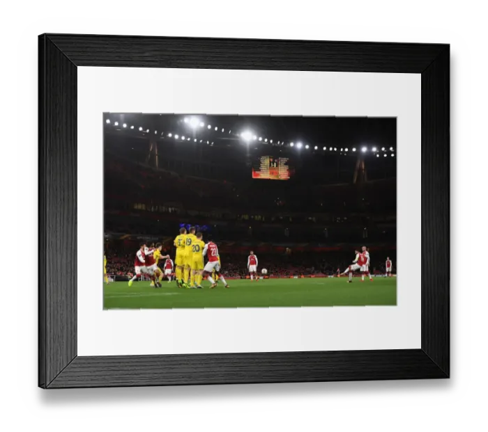 Framed Print : Theo Walcott Takes a Free Kick for Arsenal against BATE Borisov in the Europa League