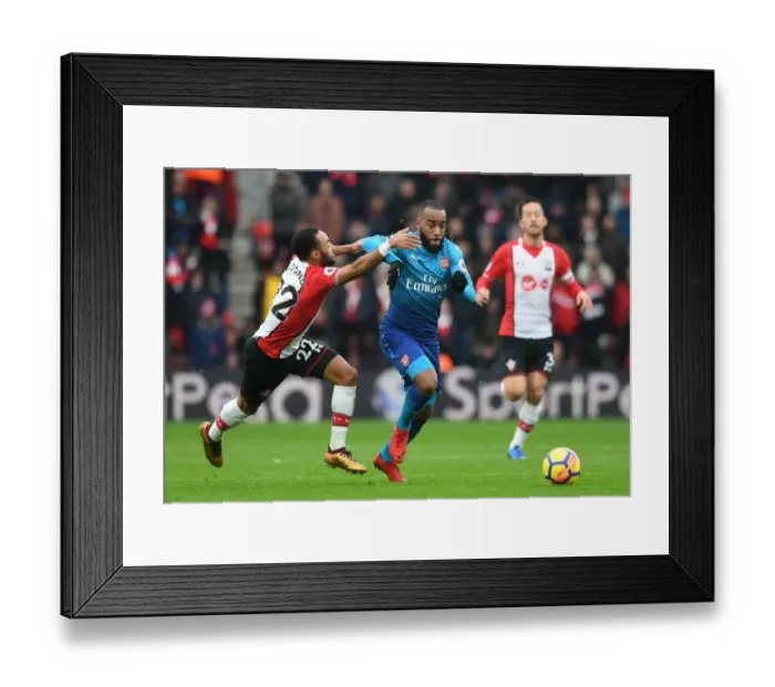 Framed Print : Clash at St. Mary's: Lacazette vs. Redmond in Southampton v Arsenal Premier League Match Framed Print : Clash at St. Mary's: Lacazette vs. Redmond in Southampton v Arsenal Premier League Match