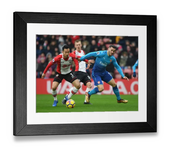 Framed Print : Sead Kolasinac vs Maya Yoshida: Intense Battle at Southampton v Arsenal, Premier League 2017-18