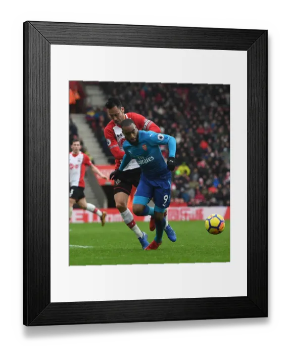 Framed Print : Clash at St. Mary's: Lacazette vs. Yoshida in Southampton v Arsenal Premier League Showdown Framed Print : Clash at St. Mary's: Lacazette vs. Yoshida in Southampton v Arsenal Premier League Showdown